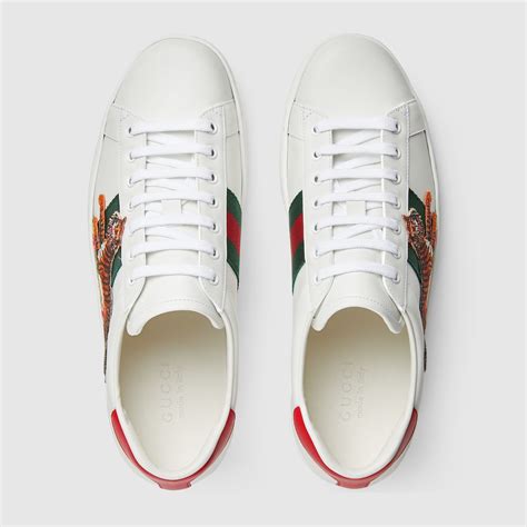 gucci ace snakeskin-trimmed leather sneakers|Gucci ace tiger sneakers.